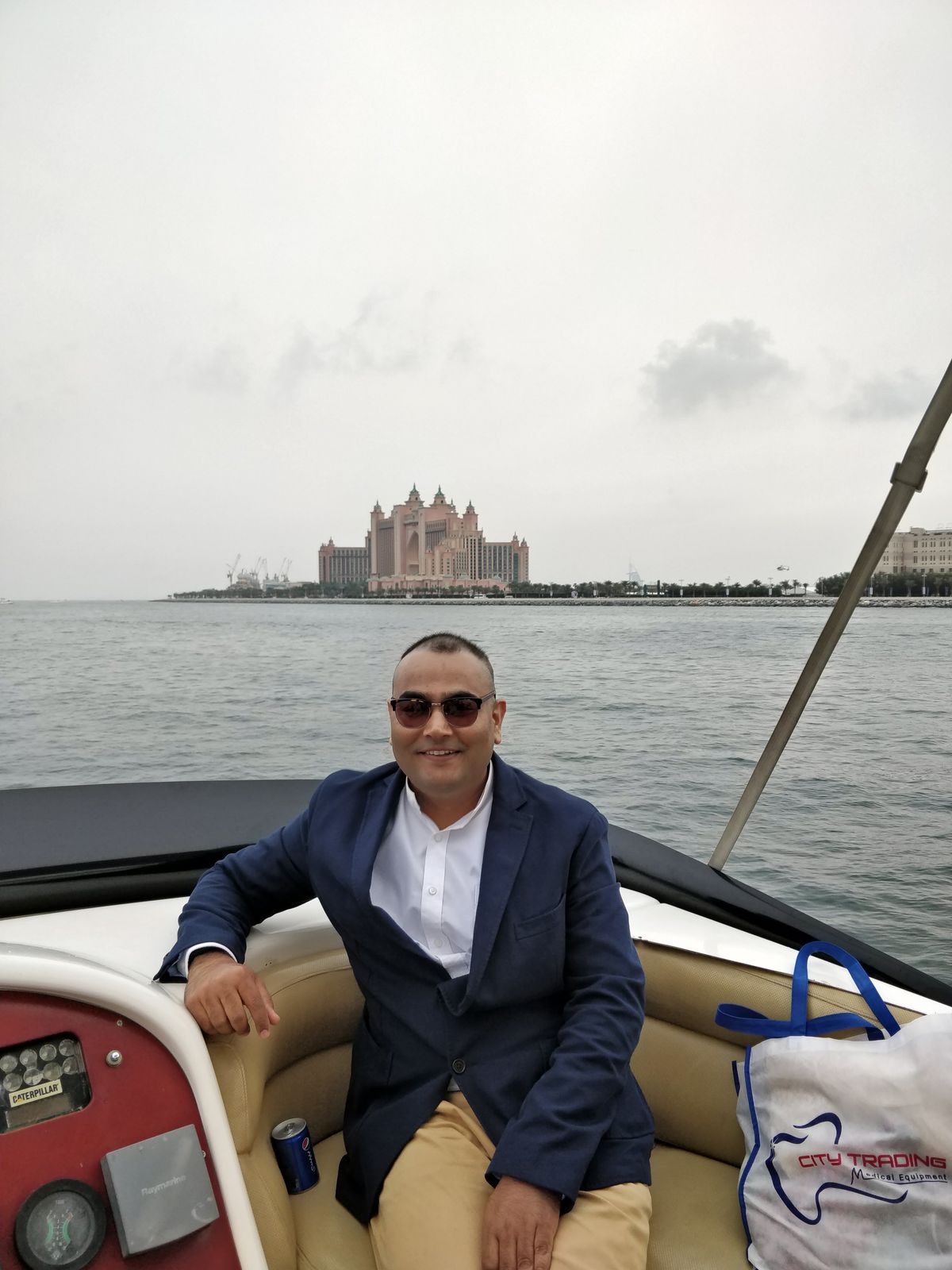 Dr. Singh on a boat off the Dubai coastline